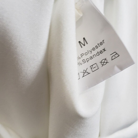 Lyaner  white layered romper with plunging neckline and button back size medium. - Picture 6 of 6